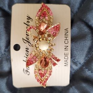 Antique gold hair barrette with complimenting color small rhinestones -